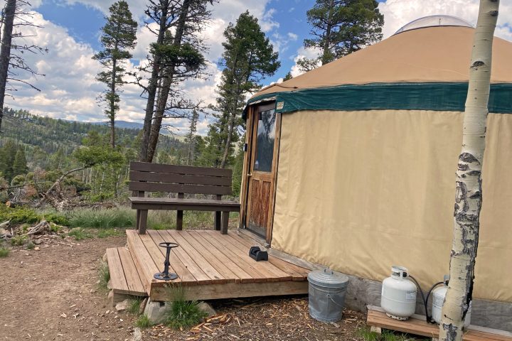 a tent on a wooden bench
