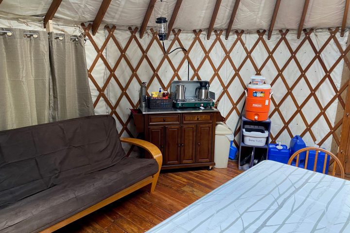 a bedroom with a wooden fence