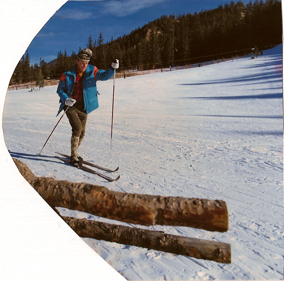 a man is cross country skiing in the snow