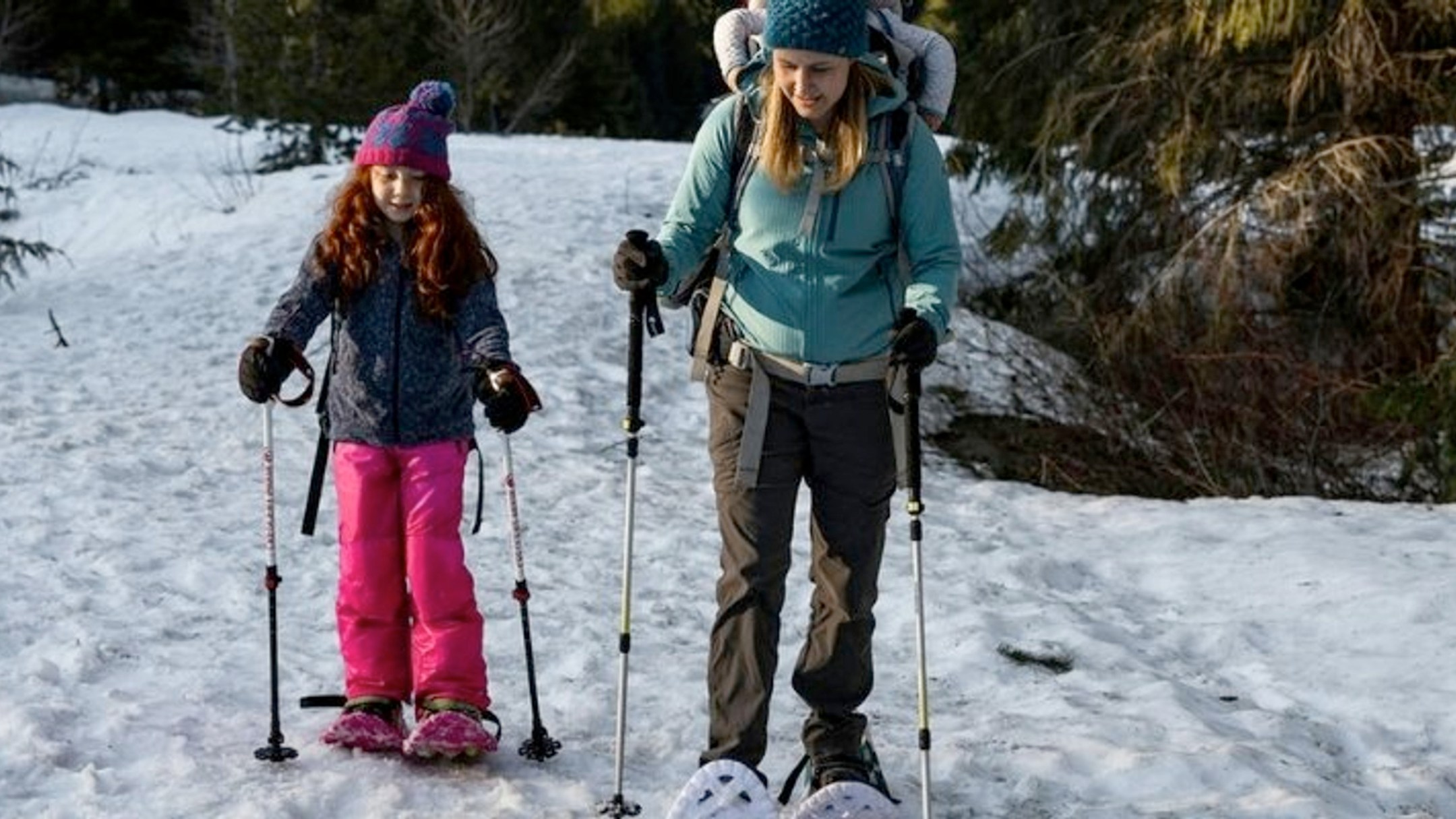 a person is standing in the snow